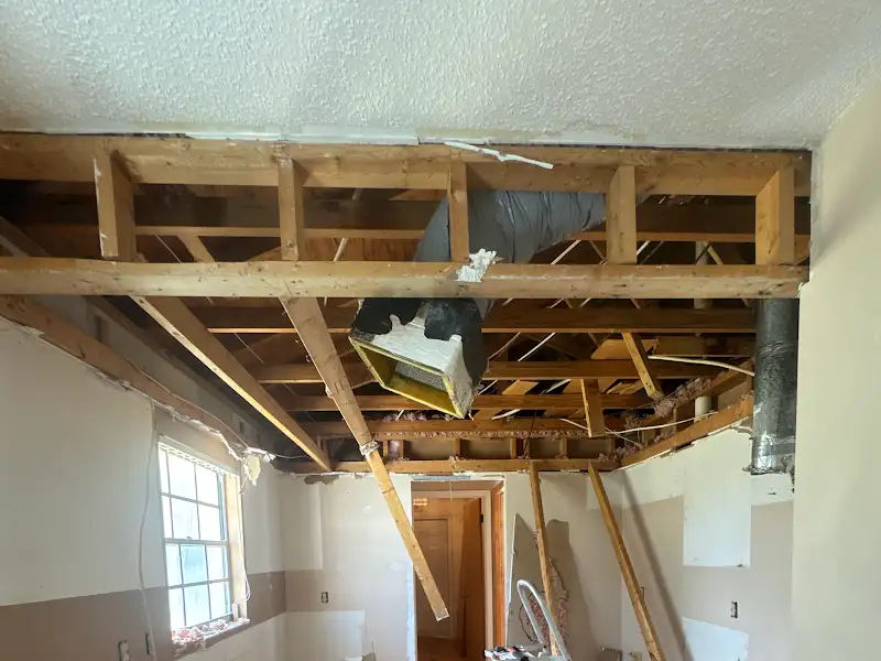 Ceiling demo with exposed framing by JM Home Industries