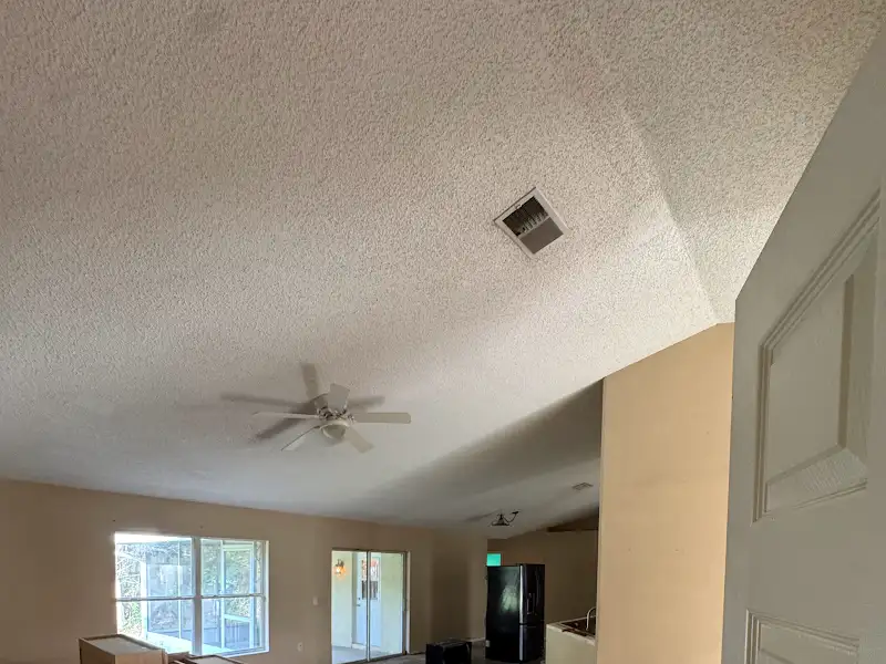 Living room ceiling before renovation by JM Home Industries