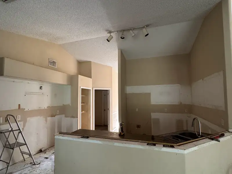 Kitchen renovation in progress cabinets removed by JM Home Industries