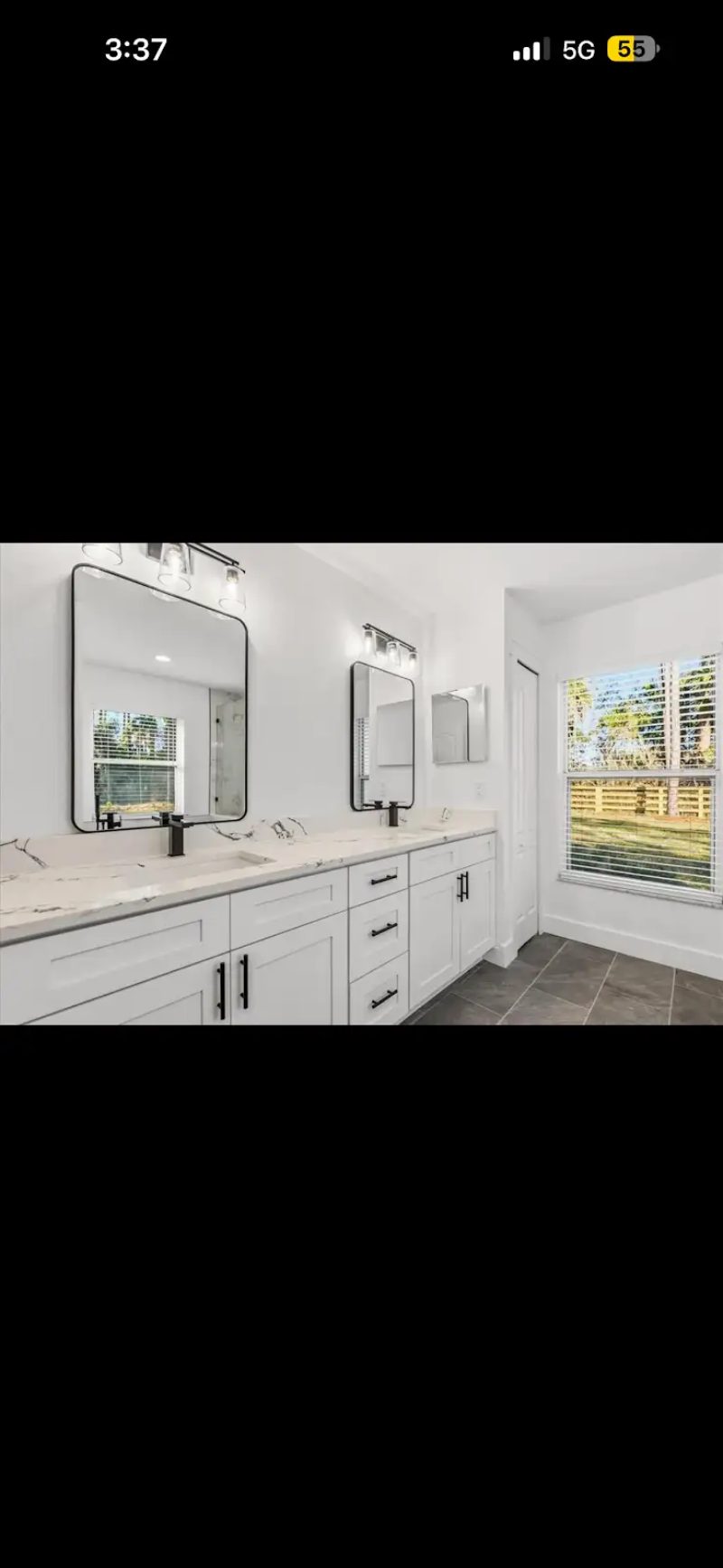 Bathroom remodel with double vanity by JM Home Industries